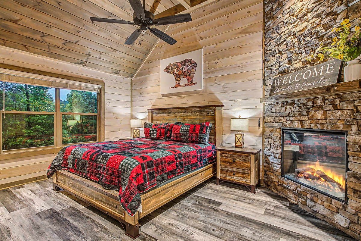 Upstairs: Bedroom 4 with King Bed with Roku TV and Electric Fireplace. Imagine the warm glow of the fireplace and peaceful calm.