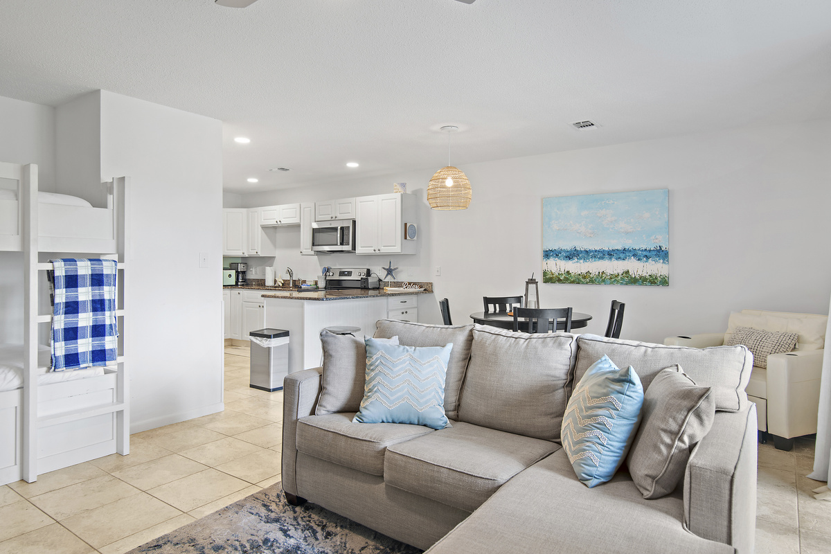 Living area, kitchen and bunks, all open to each other