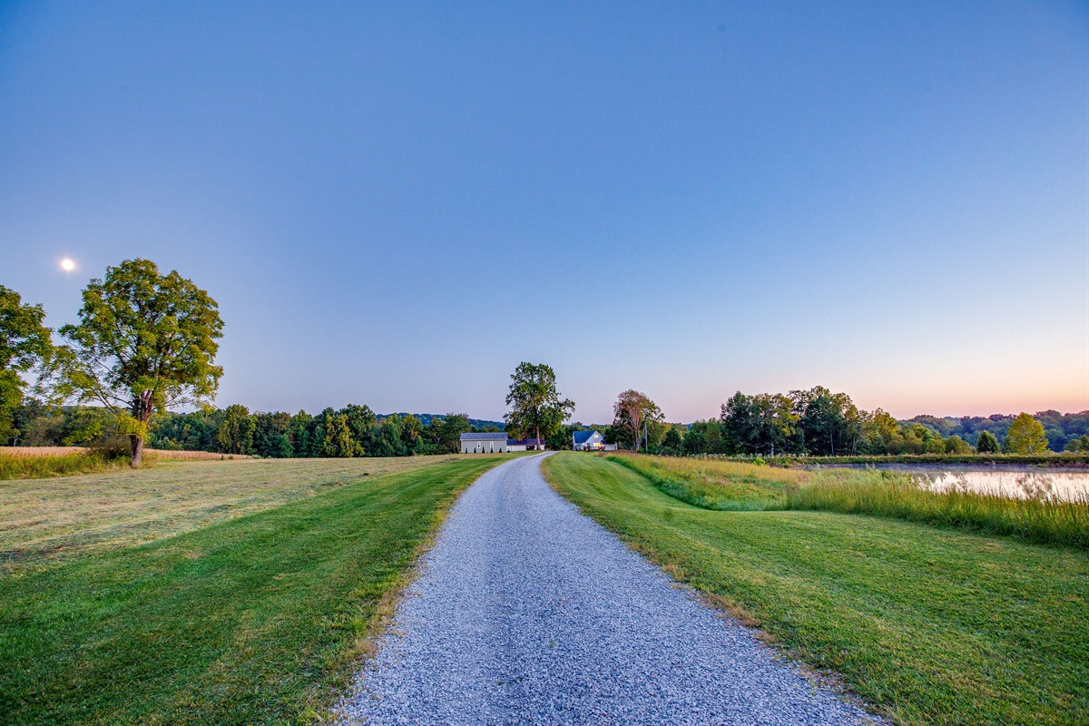 The Farmhouse sits away from the road, surrounded by picturesque views in every direction.