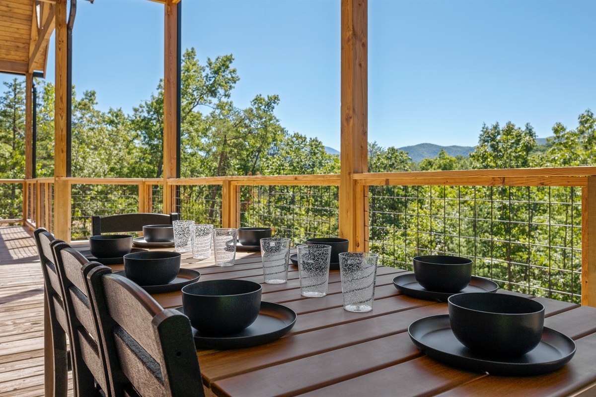 The outdoor dining table is private and has seating for eight. 