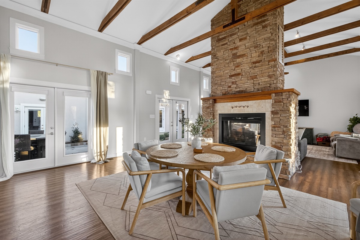 Dine with a cozy fireplace backdrop