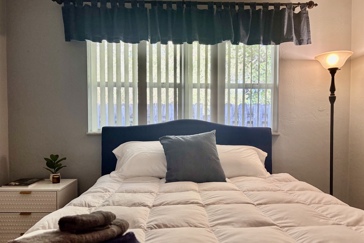 Our second bedroom is comfortable with plenty of closet space.