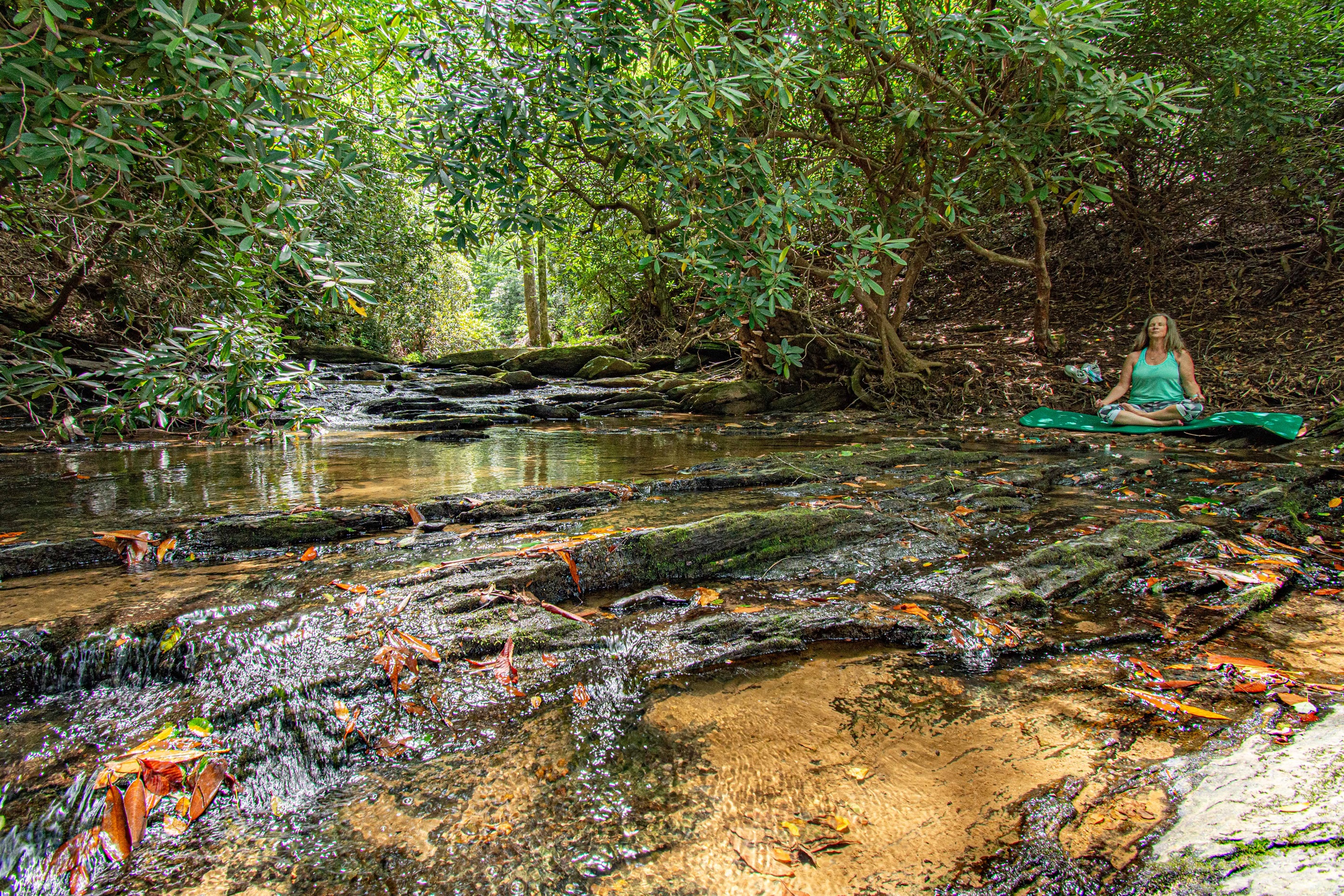 ✨ Hike down to Shoal Creek and unwind by the peaceful, shaded water’s edge — your private slice of mountain serenity. 🌿