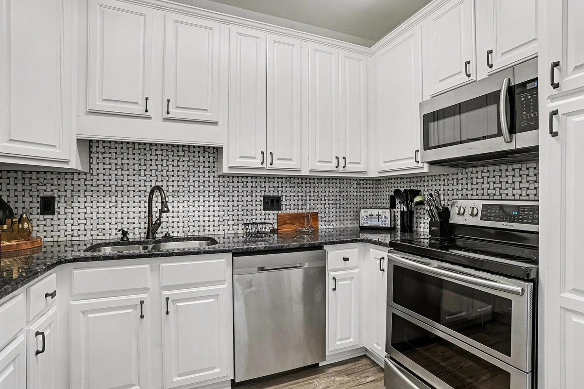 Cook with ease — electric stove, microwave, air fryer, and full cookware provided