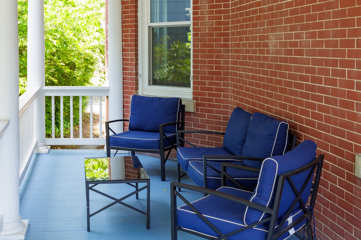 Large Wrap around porch with privacy around the corner if a guest is to stay in the other unit.
