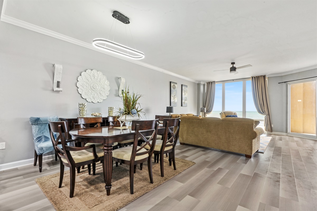 Dining area looking into living room/balcony door