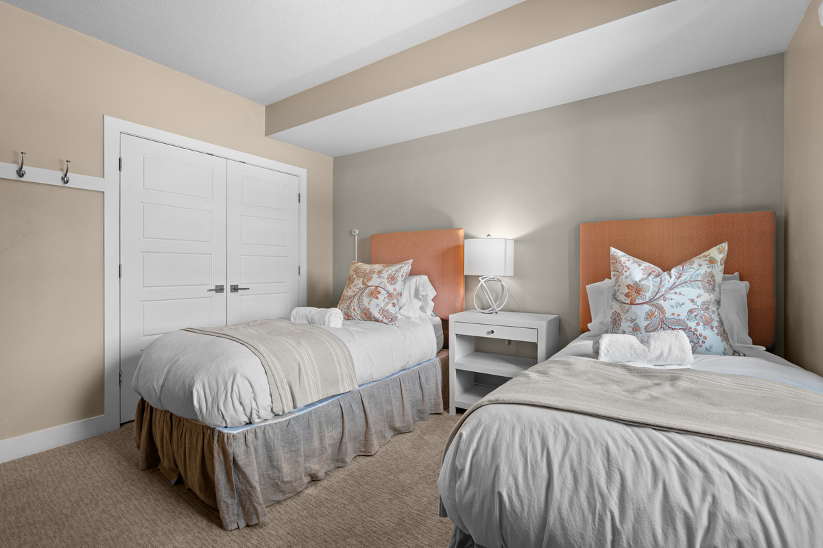 Two Twin XL beds offer a comfortable retreat for kids or friends.