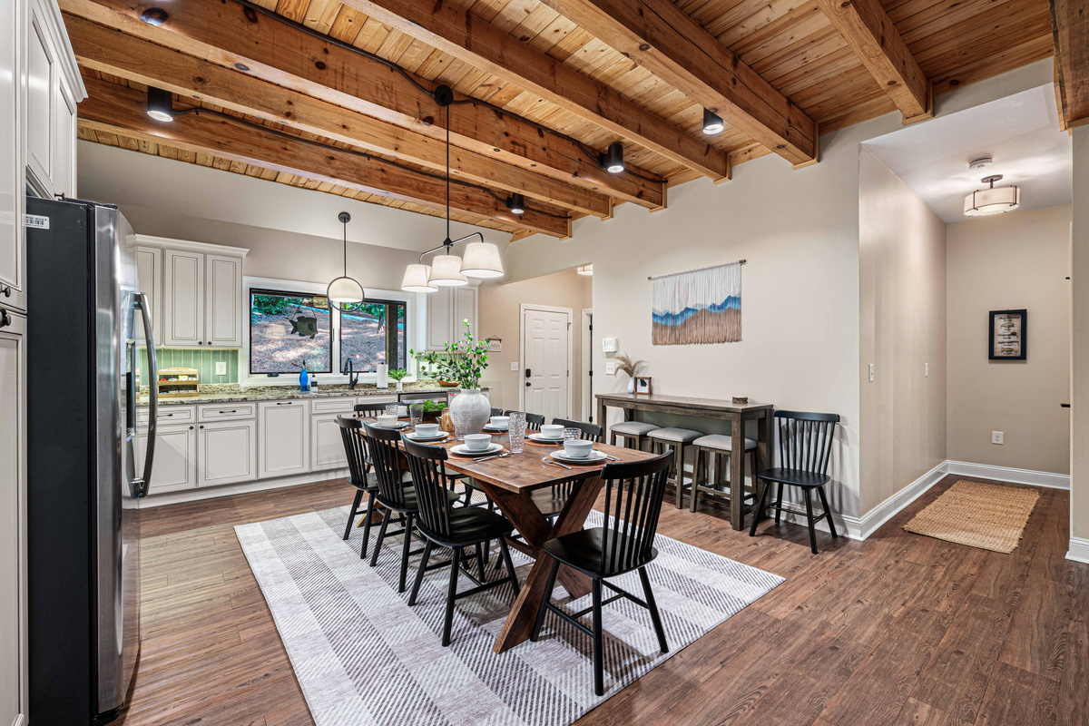 Seating for 12 with the kitchen table and bar table