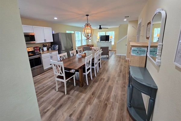 Dining table has plenty of seating for your meals and board games.