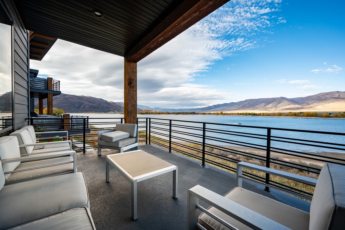 Spacious balcony with comfortable seating and breathtaking views of Pineview Reservoir.