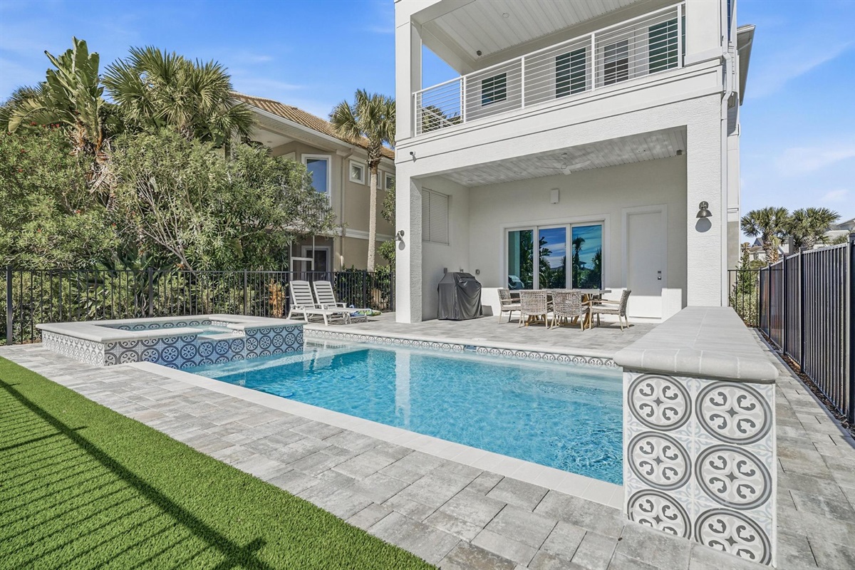 After a salty beach day, come home to your private pool and spa, fire up the grill under the shaded patio, and linger over dinner while the water shimmers beside you—an easy, sunlit routine that feels like it was made for you.
