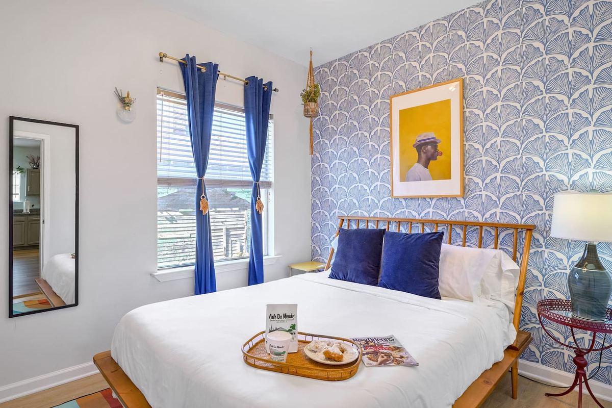 Enjoy breakfast in bed in the 'Blue Room' featuring a plush queen mattress and funky decor. 