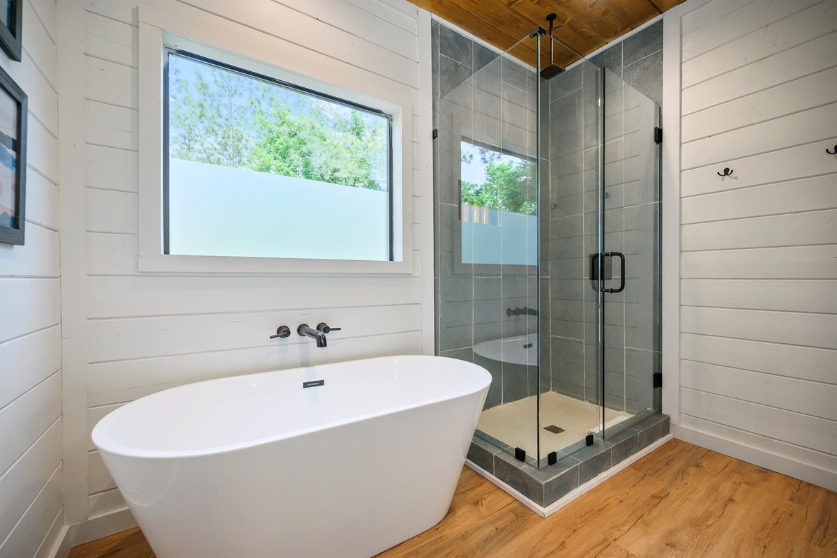 Walk-in shower, soaking tub, and dual vanities for total luxury.