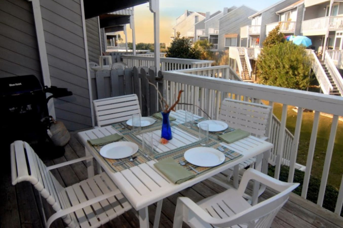 Pull up a chair on the upper deck and let the Gulf view do the rest &mdash; this is where dinner happens every night.