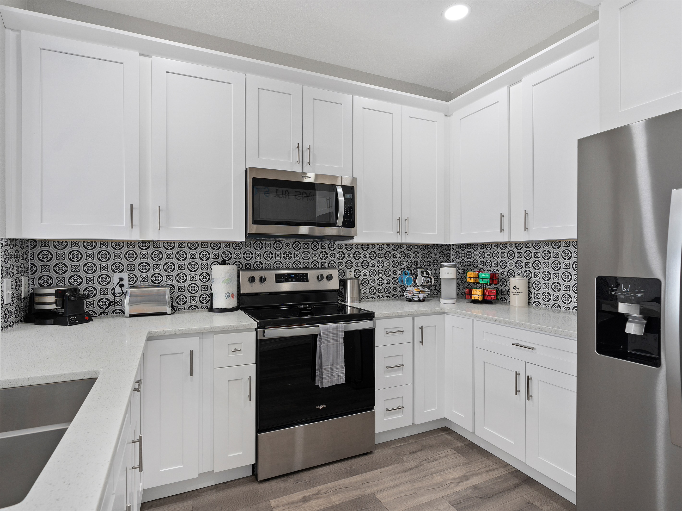 Sleek Kitchen Featuring Fresh Cabinets and New Appliances