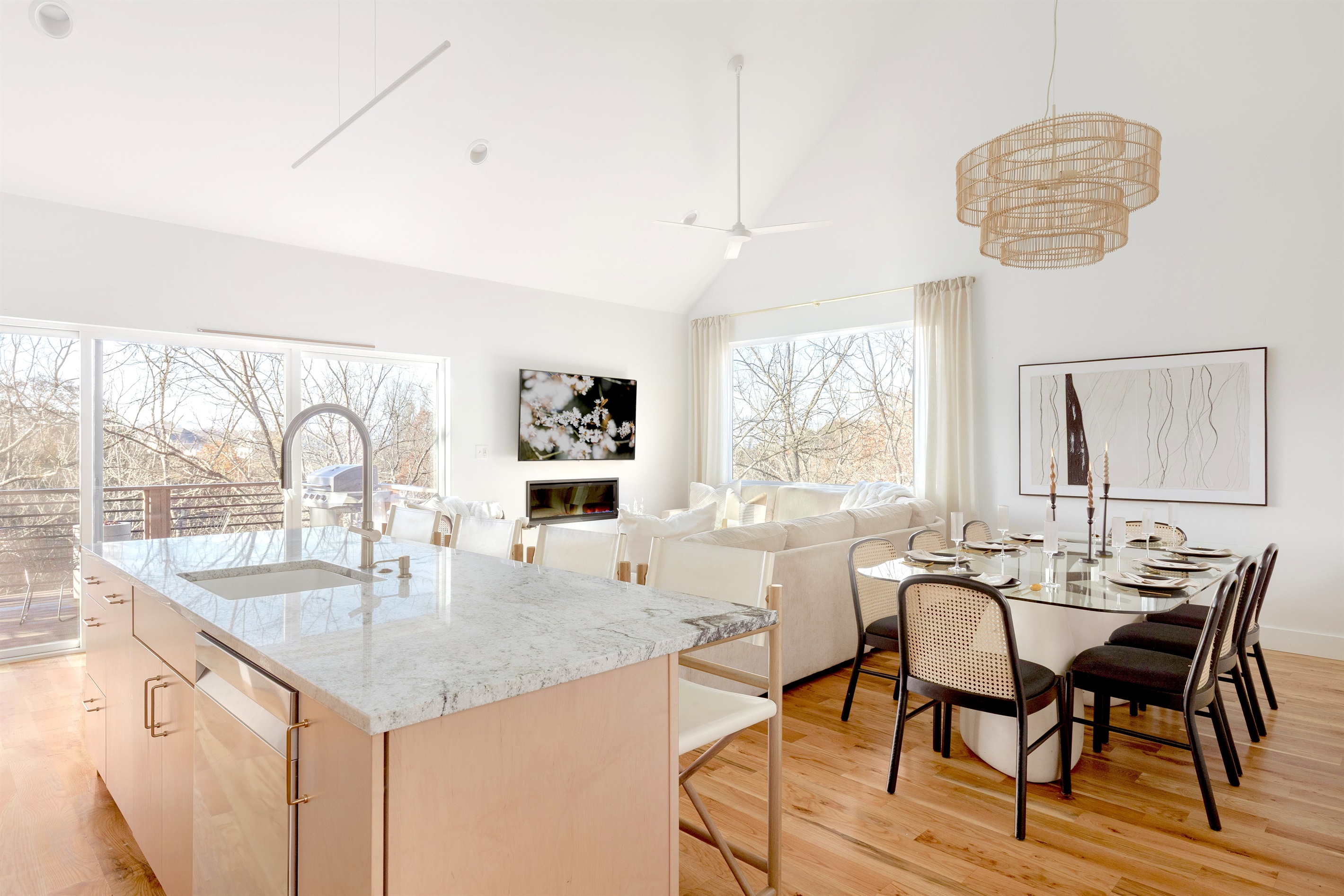 {Kitchen + Living} An airy, open-concept space with mountain views, a spacious island, and seamless flow for groups to gather in comfort.