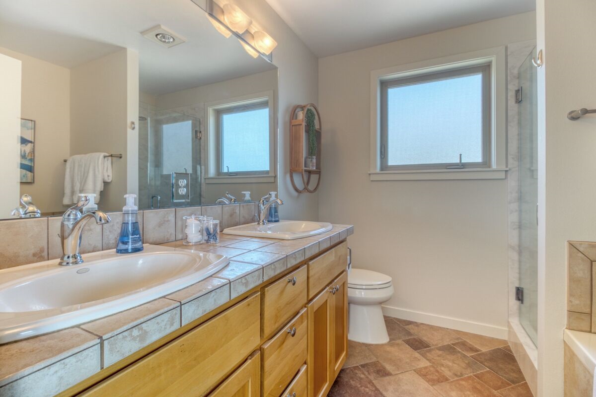 Spa inspired touches including a walk-in glass shower.