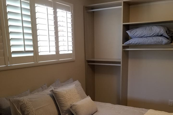 The Master walk-in closet serve as a 4th bedroom. This private master closet is huge  (used to be a  4th bedroom). Easily accommodates the available queen size auto blow-up bed or the rollaway twin, both stored on property.