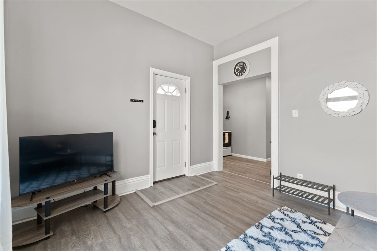 Relax in our cozy living room complete with a TV for your entertainment.