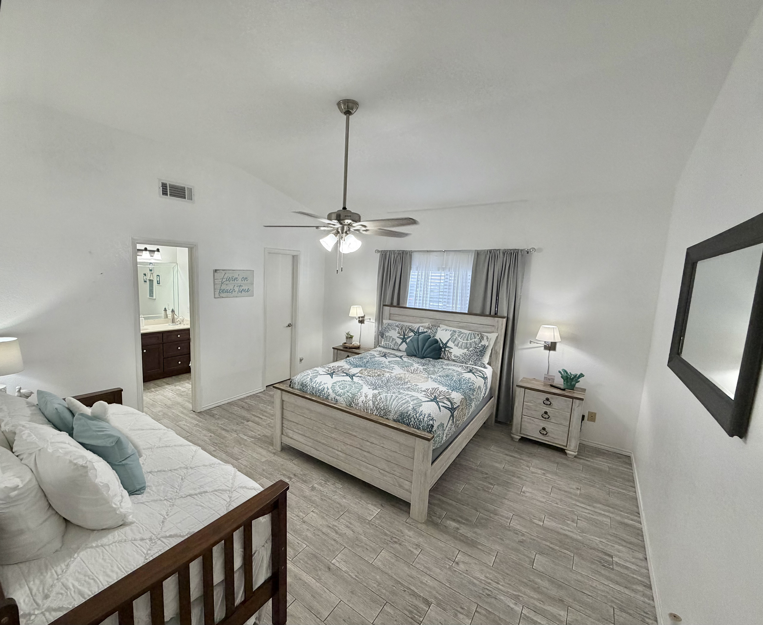 Coastal Comfort – Spacious Queen & Twin w/trundle Bedroom