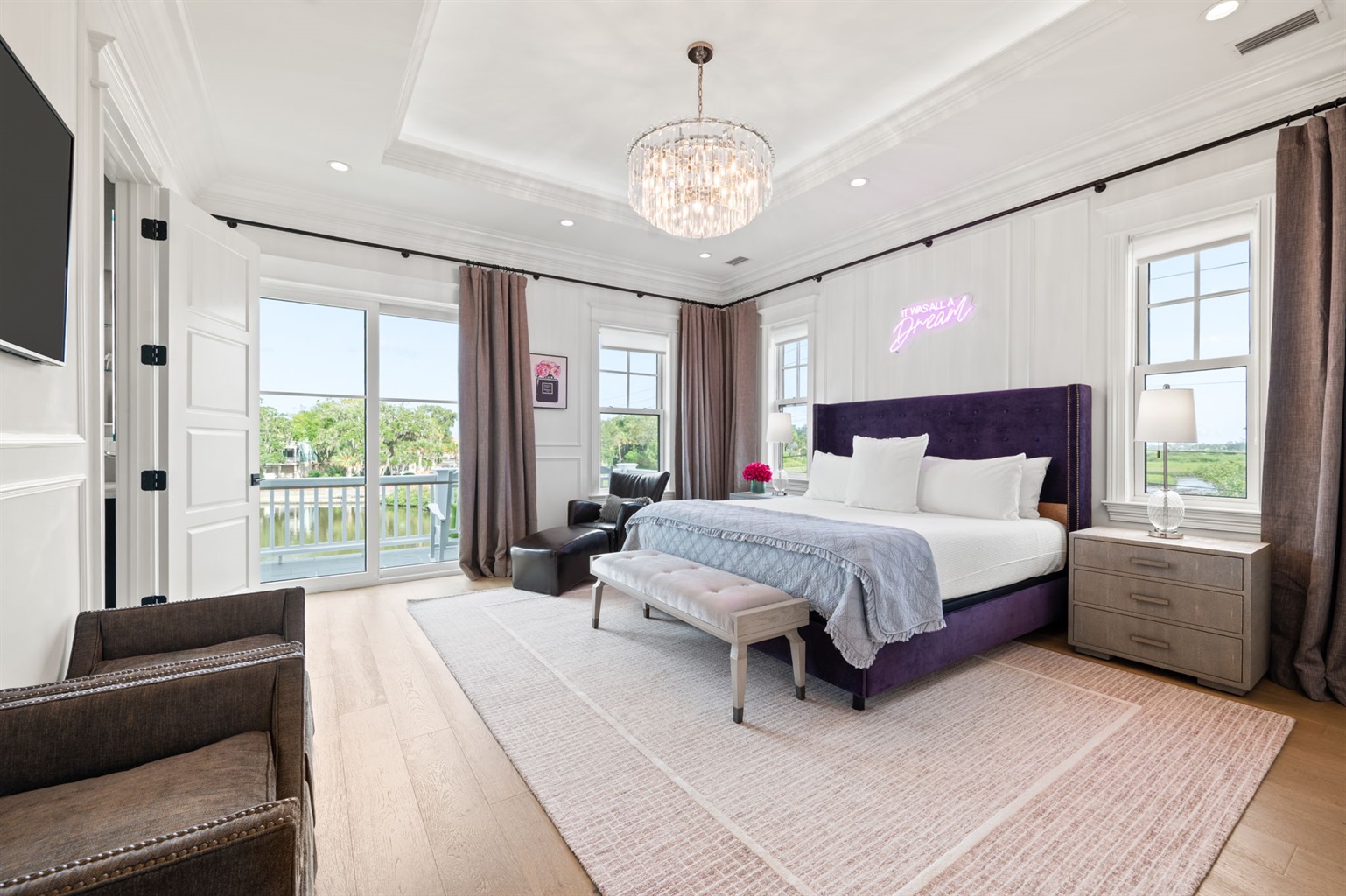 Spacious king suite, balcony with lake view and ambient lighting, day or night