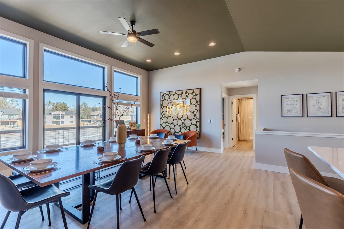 Our dining area & kitchen island will seat up to 16 guests while overlooking the man made lake.  Play games & or  eat meals together all in the same space.