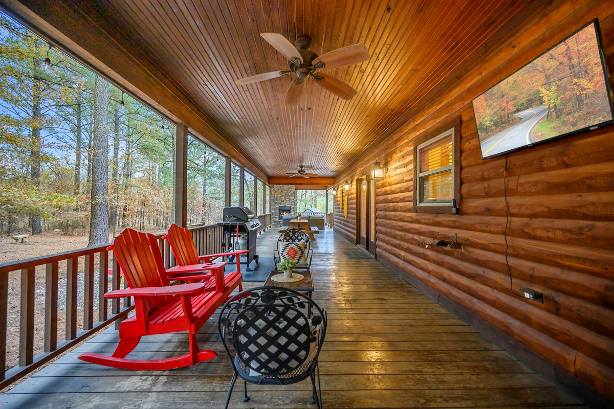 Large covered deck with hot tub + grill &mdash; outdoor living at its best.