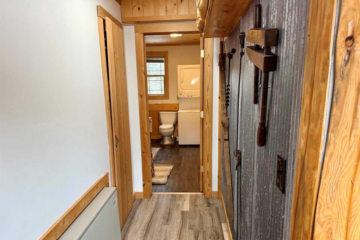 Down the hall to the bathroom room is another wall heater to keep you warm. 