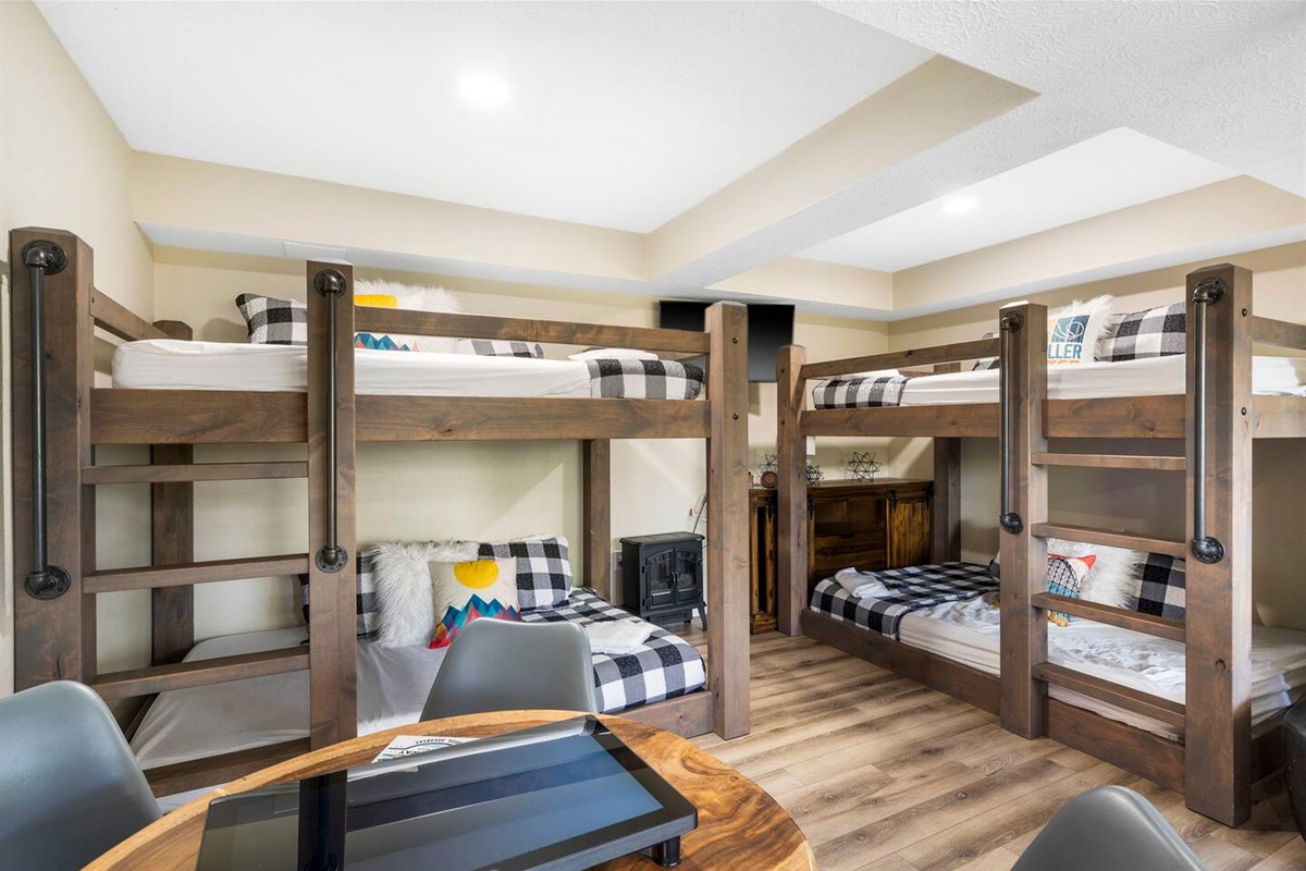 Spacious bunk/game room - a hit for kids and groups alike.