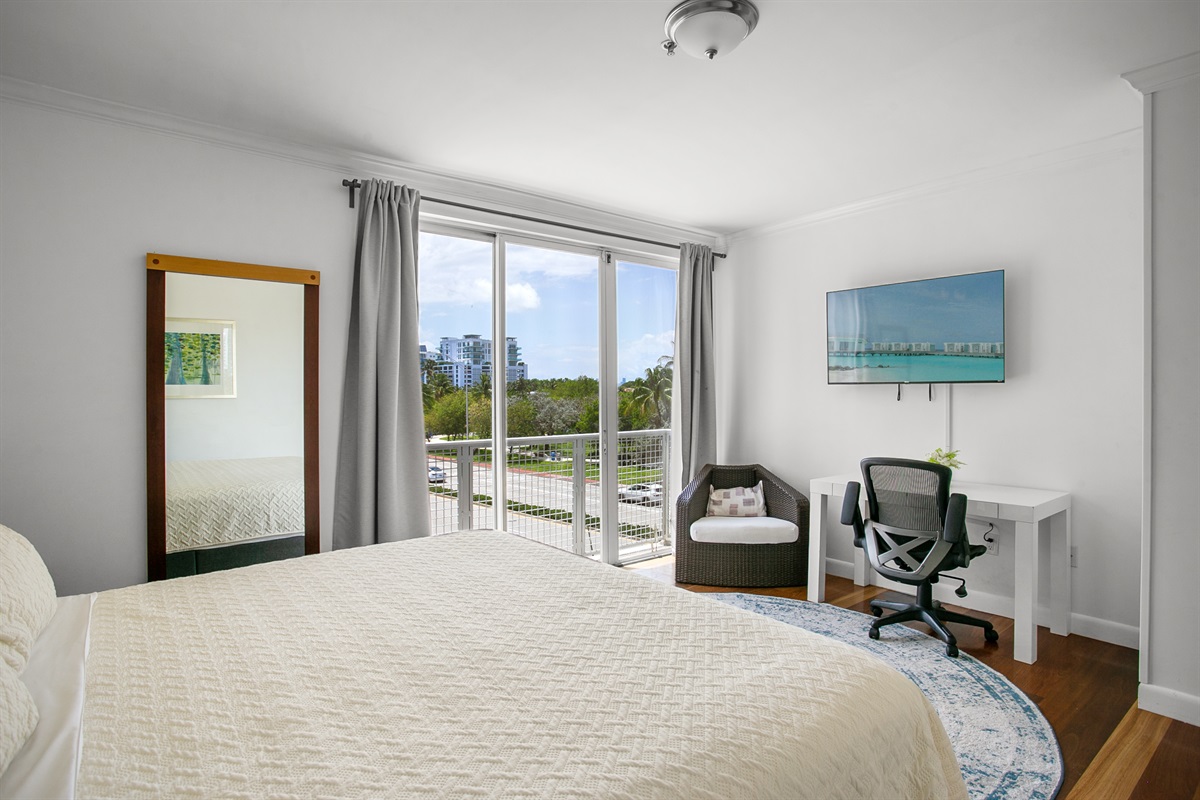 Very private Primary Suite with desk, walk-in closet, and en-suite bath