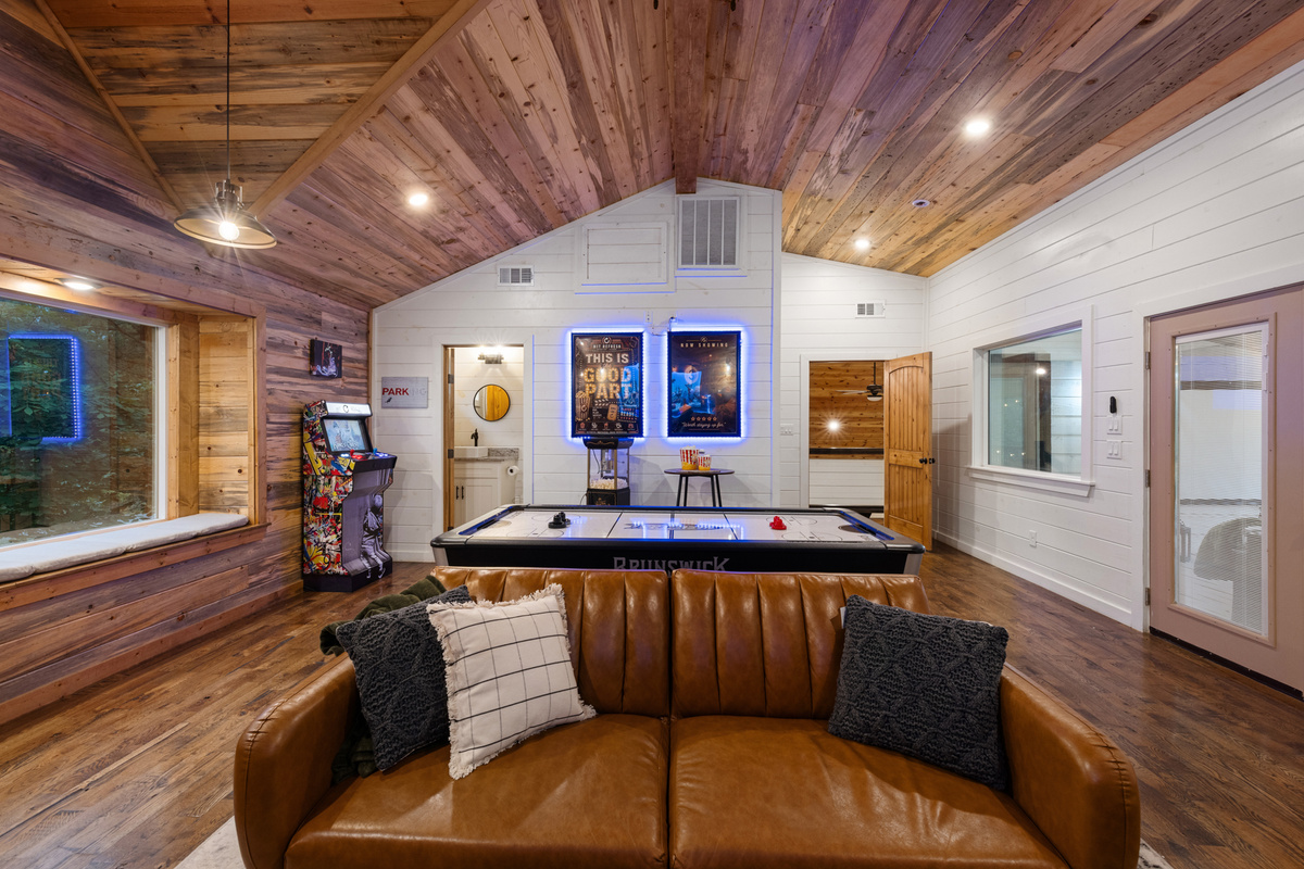 Upstairs game room and bunk loft at Hit Refresh feels like every kid’s drea
Arcade battles, late night air hockey tournaments, cozy bunk room sleepovers, and the kind of laughter that carries long after the trip is over. 