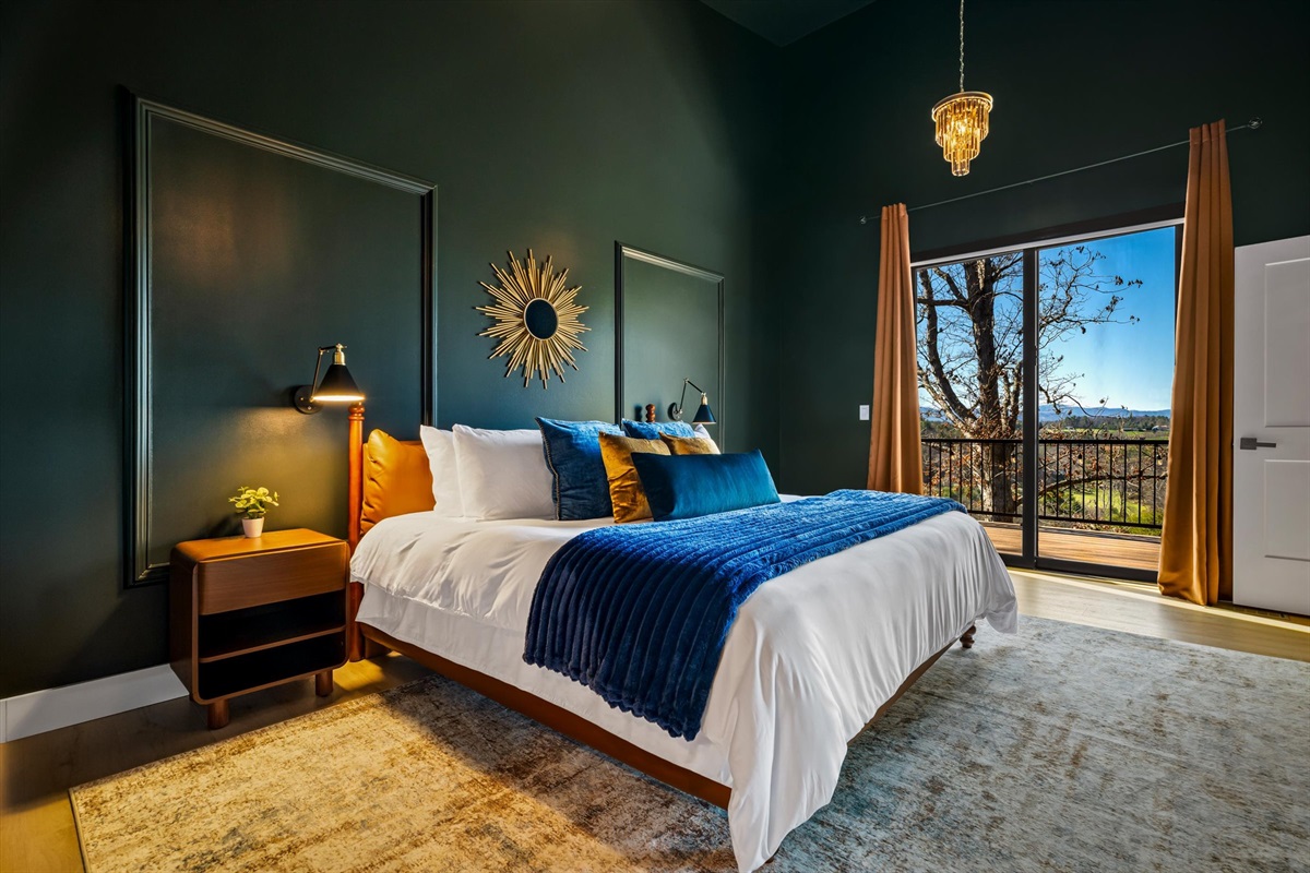 {Primary Suite + Balcony}
Open the door to mountain air — a seamless indoor-outdoor flow that makes mornings and evenings feel effortless.