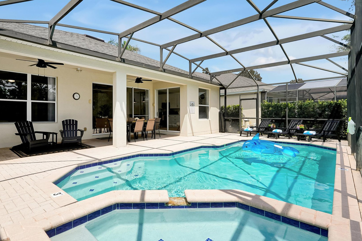 Poolside Lanai: Spacious screened pool deck with a private pool and spa, covered dining area, barbecue and plenty of seating.