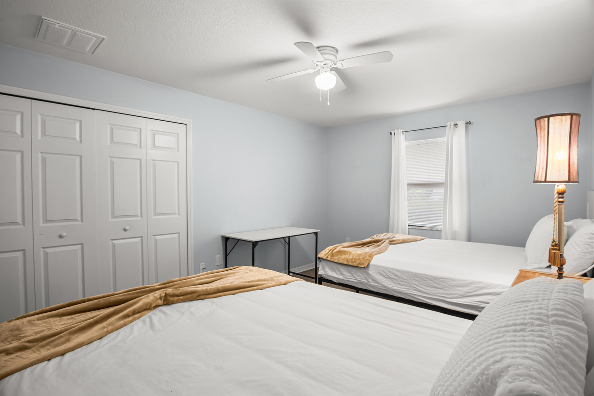 Unit #1 Left: Bedroom #2. Natural light.