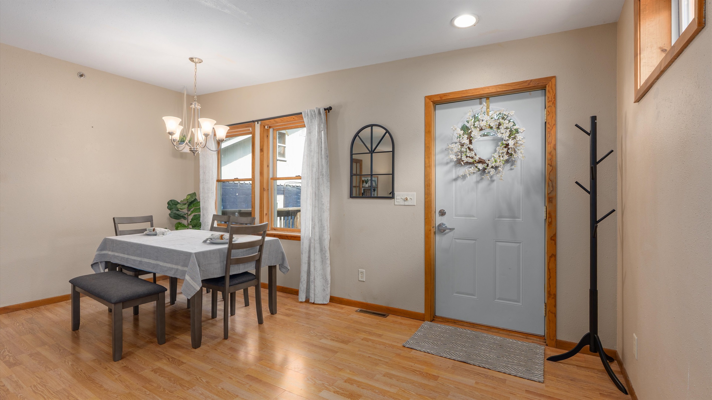The front door leads out onto the large deck with intermittent views of Lake Pepin.