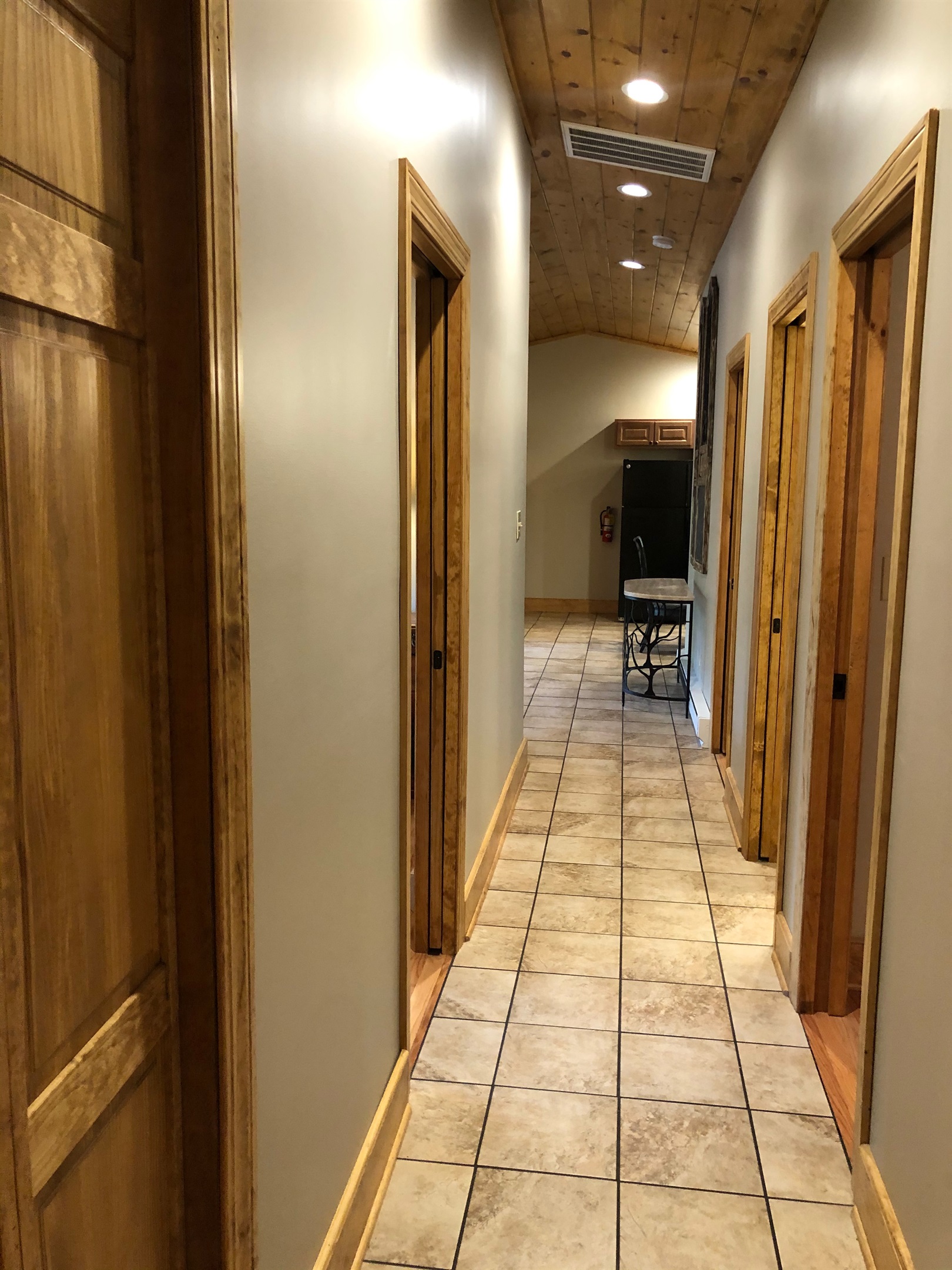 Hallway of bedrooms and bathrooms.