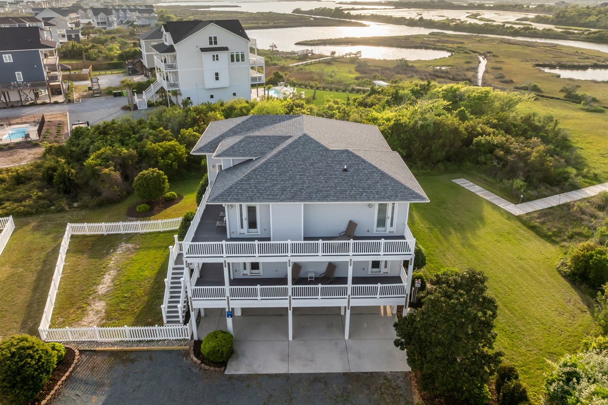 Beautifully lit exterior at sunset creating the perfect relaxing coastal atmosphere