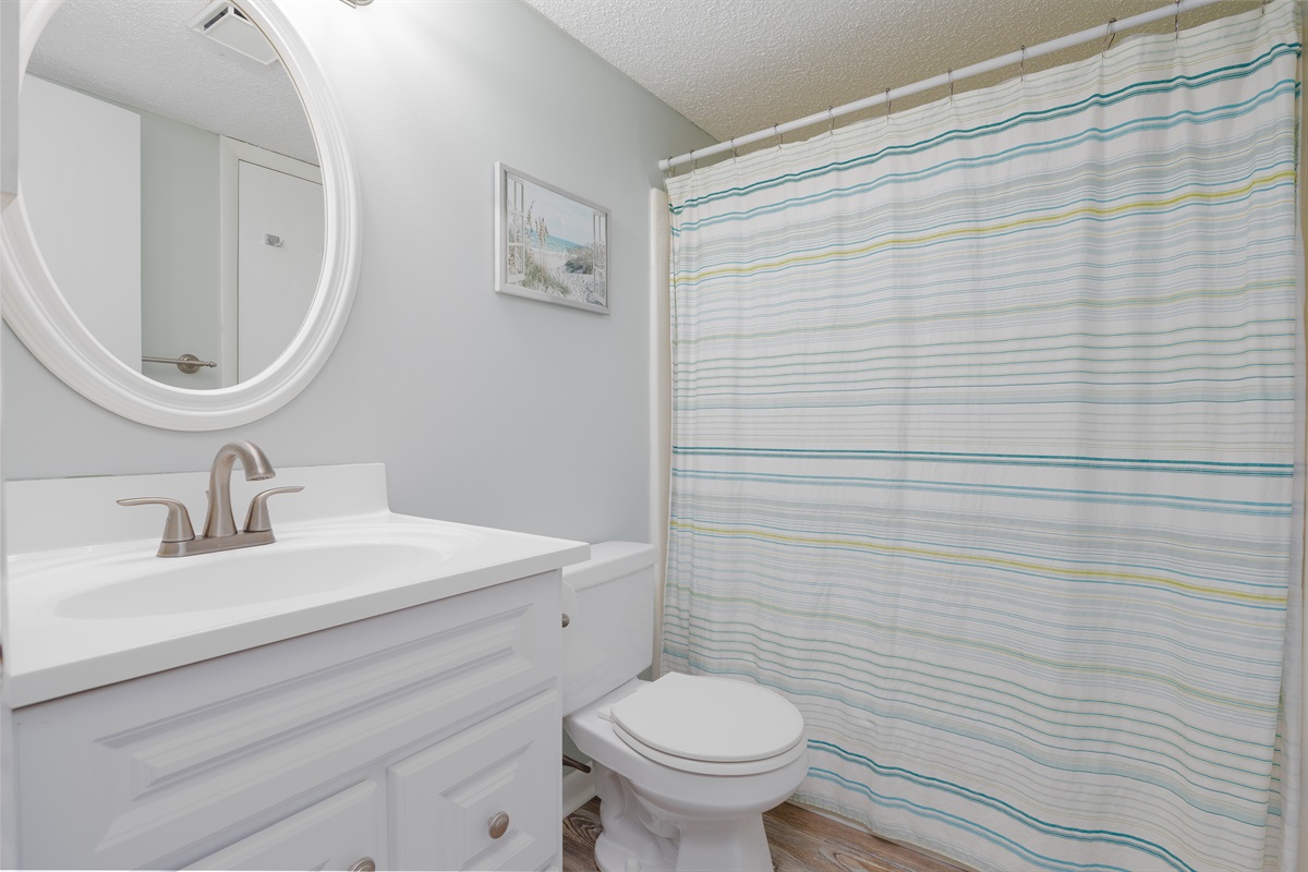 A clean, modern hallway bathroom