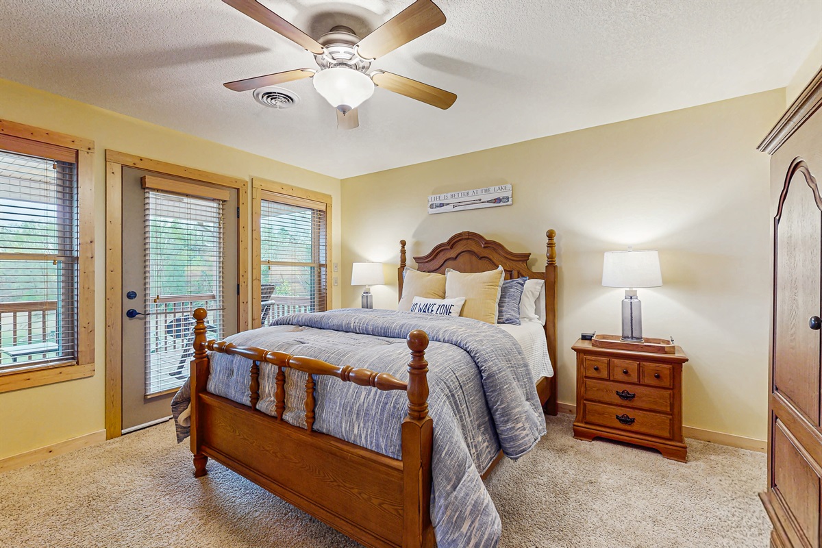 True spacious master bedroom with large private bathroom attached and walkout to the deck with spectacular views over the lake!