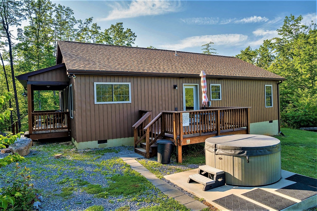 Relax on the deck and take in the quiet surroundings, where fresh mountain air and nature create the perfect escape.