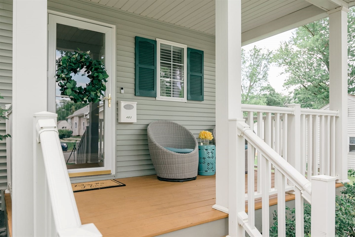 Inviting front porch with Wyze video cam doorbell and keyless entry lock.