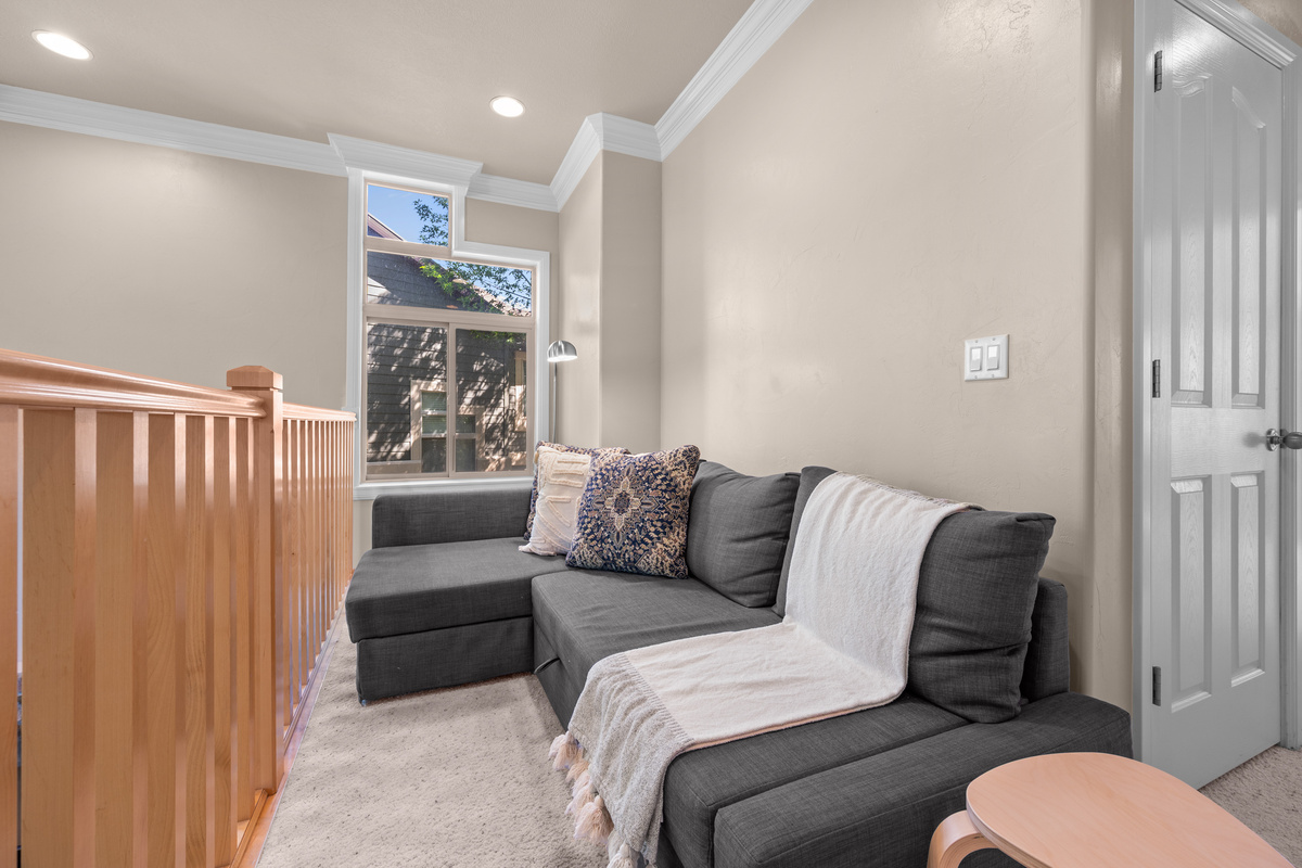 Cozy loft seating area—perfect for reading, relaxing, or quiet moments.