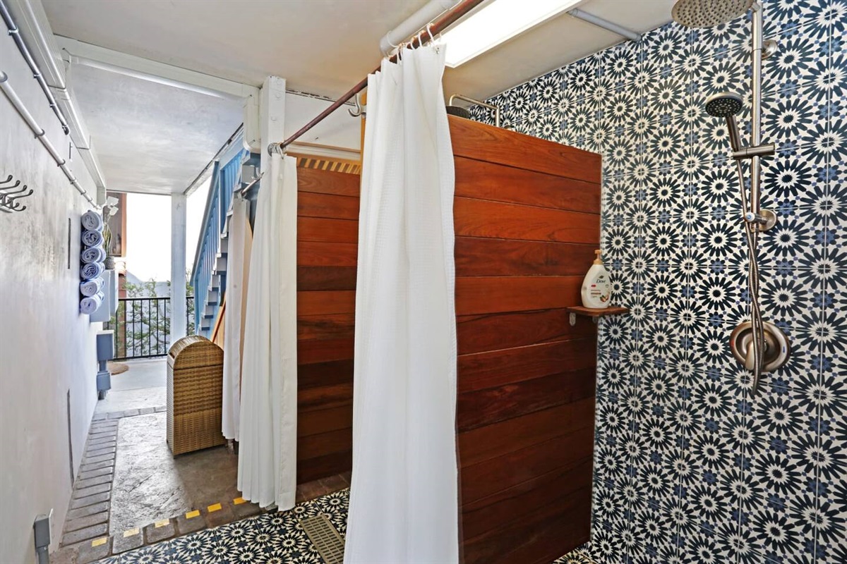 The building also offers two outdoor showers and a changing room for after the beach or as a backup if everyone is getting ready at once (send the boys outside)