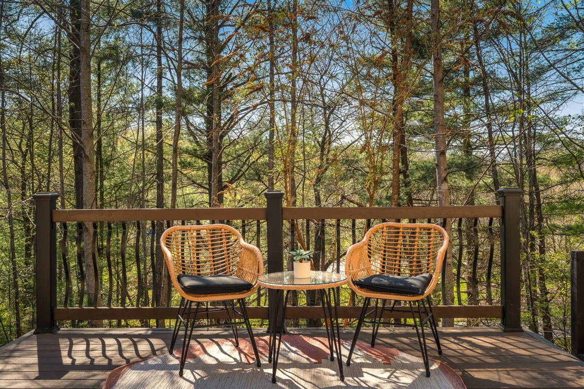 Covered outdoor seating area - comfortable space to relax rain or shine