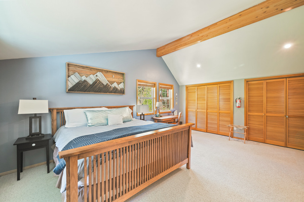 Bedroom #1 of 3: upstairs primary with king bed and en suite bathroom