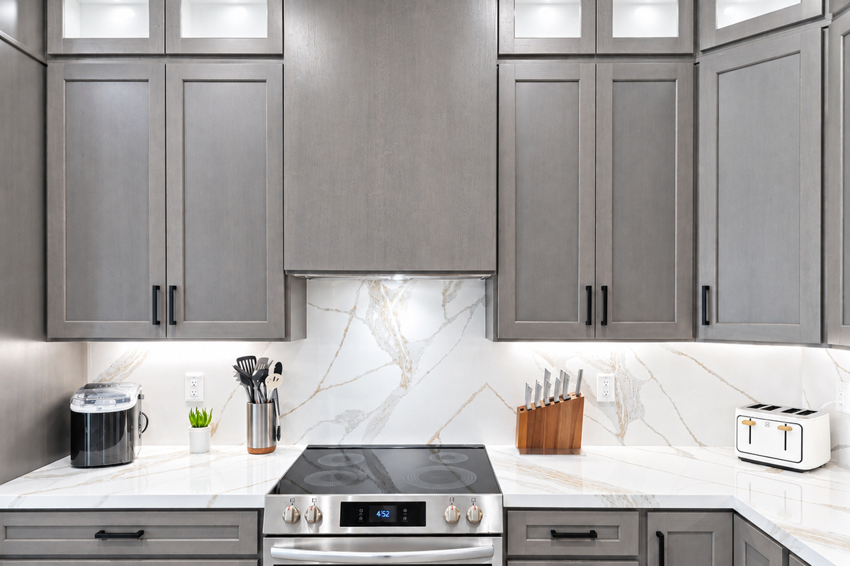 Bright and modern kitchen with stainless steel appliances.