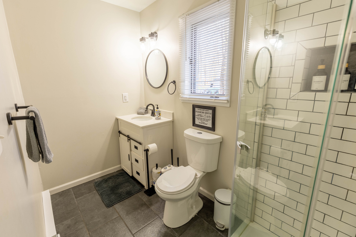 Our downstairs bathroom is spacious and bright! 