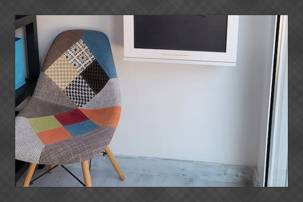 Cabinet with emergency supplies that converts into a desk. 