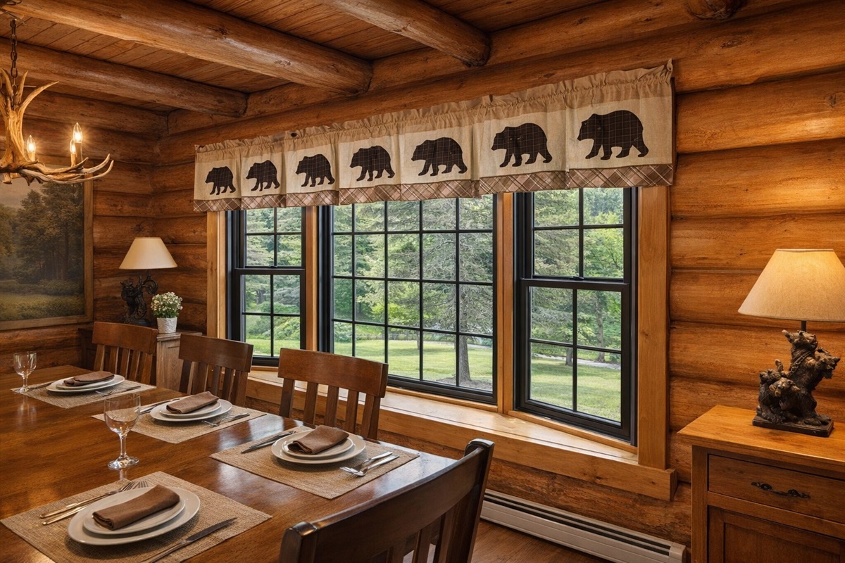 Gather around the 8-person dining table with picture-perfect forest views through the bay window—ideal for family meals, game nights, or morning coffee in the sunshine.