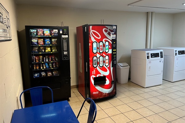 Laundry Room with seating and vending machines